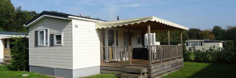 Bangunan Cozy Chalet With Veranda Near the Loonse and Drunense Duinen