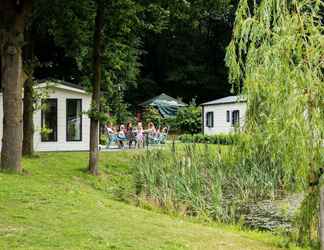 Exterior 2 Cosy Chalet With Wifi, Within the Nature of De Veluwe