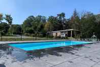 Swimming Pool Comfy Chalet With a Dishwasher, Directly on a Pond