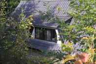 Bangunan Detached Bungalow With Terrace in a Wooded Area