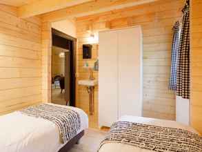 Kamar Tidur 4 Cozy, Wooden Lodge With a Veranda, Located in the Veluwe