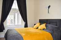 Bilik Tidur Bright City Centre Flat With Sea 2 Mins Away