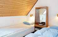 Bedroom 2 4 Person Holiday Home in Nexo