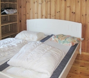 Bedroom 4 8 Person Holiday Home in Mandal, Norge