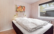 Bedroom 4 Elegant Holiday Home in Jutland With Whirlpool