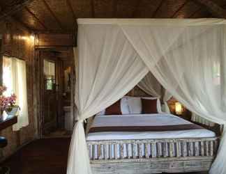 Kamar Tidur 2 Royal Jj Ubud Resort and Spa Deluxe Room Pool View