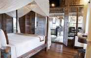Kamar Tidur 6 Royal Jj Ubud Resort and Spa Deluxe Room Pool View