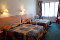 ห้องนอน Hotel du Cheval Rouge