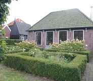 Exterior 2 Pleasant Holiday Home in Grootschermer With Garden