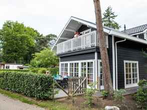 Exterior 4 Detached Chalet With Dishwasher, in the Middle of De Veluwe
