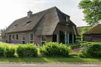 Bangunan Attractive Farmhouse in Hardenberg-rheeze With Garden