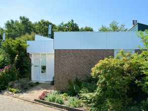 Exterior 4 Fresh & Colorful Holiday Home near Beach, Sea, Dunes, & Lake