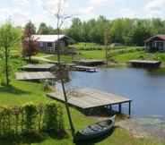 Nearby View and Attractions 7 Combined Chalets With a Bathroom, Located Near a Pond