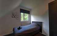 Bedroom 5 Lavish Villa in Zeewolde With Sauna