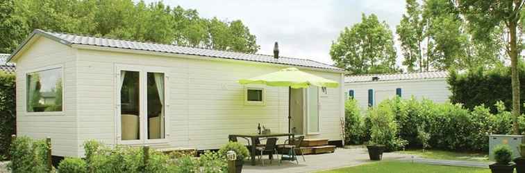 Bangunan Tidy Chalet With a Microwave, Near the Wadden Sea