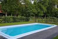 Swimming Pool Luxury Farmhouse near Forest in Dinkelland