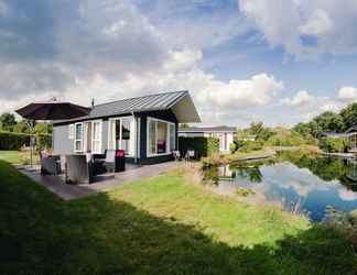 Exterior 2 Enticing Chalet With a Dishwasher, Directly on a Pond