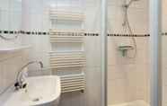 In-room Bathroom 4 Detached Bungalow in Nes on Ameland With Spacious Terrace