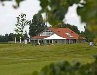 Exterior 2 Holiday Home in Zeewolde With Jetty Next to Golf Course