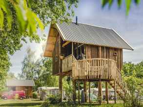 Exterior 4 Beautiful Treehouse With a Terrace, at the River De Regge