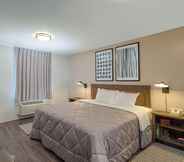 Bedroom 5 InTown Suites Extended Stay Atlanta GA - Lilburn