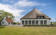 Exterior 2 Spacious Farmhouse in Dutch Coast, Texel With Garden