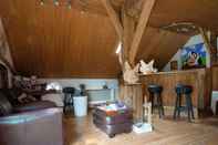 Bar, Cafe and Lounge Attractive Holiday Home With a Wood Stove, Located on a Farm