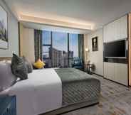 Bedroom 5 Ramada by Wyndham Luoyang Downtown