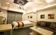 Kamar Tidur 2 Hotel Bintang Pari Resort - Adults Only