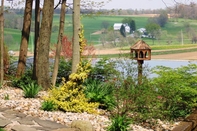 Exterior Sojourner's Lodge & Log Cabin Suites