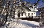 Exterior 7 Holiday Home in a Quiet, Authentic Mountain Village With a View of the Surrounding Hills