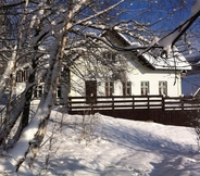 Exterior 7 Holiday Home in a Quiet, Authentic Mountain Village With a View of the Surrounding Hills