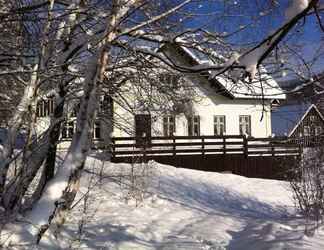 Exterior 2 Holiday Home in a Quiet, Authentic Mountain Village With a View of the Surrounding Hills