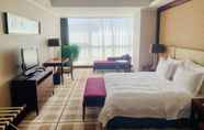 Kamar Tidur 4 Grand New Century Hotel Hohhot