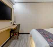 Kamar Tidur 6 Yimi Hotel Wuyang New Town