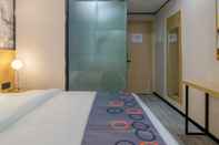 Kamar Tidur Yimi Hotel Wuyang New Town