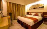 Kamar Tidur 3 The New Dongyuan International Hotel