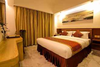 Kamar Tidur 4 The New Dongyuan International Hotel