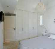 Bedroom 3 Luxury Villa By The Beach by VillaRentalsgr