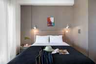 Kamar Tidur Thisean Modern Suites by Athens Stay