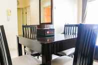 ห้องนอน Strategic and Comfy 2BR City Home MOI Apartment