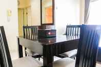 ห้องนอน Strategic and Comfy 2BR City Home MOI Apartment