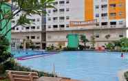 Kolam Renang 6 Warm and Cozy 2BR Green Pramuka Apartment near Mall