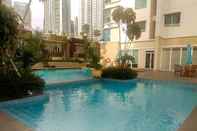 Kolam Renang Modern 3BR Apartment at Springhill Terrace Residence