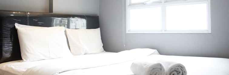 Bedroom Modern & Comfy 2BR Apartment at Gateway Pasteur