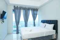 Kamar Tidur Minimalist Studio Apartment at Puri Mansion