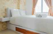 Bedroom 7 2BR Homey Apartment at Bassura City near Mall