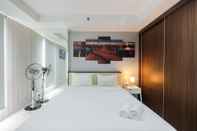 Bedroom Elegant and Comfy Studio Azalea Suites Apartment Cikarang