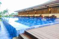 Swimming Pool Elegant and Comfy Studio Azalea Suites Apartment Cikarang