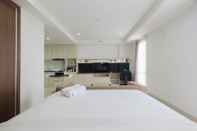 Bedroom Luxury Studio Room at Azalea Suites Apartment